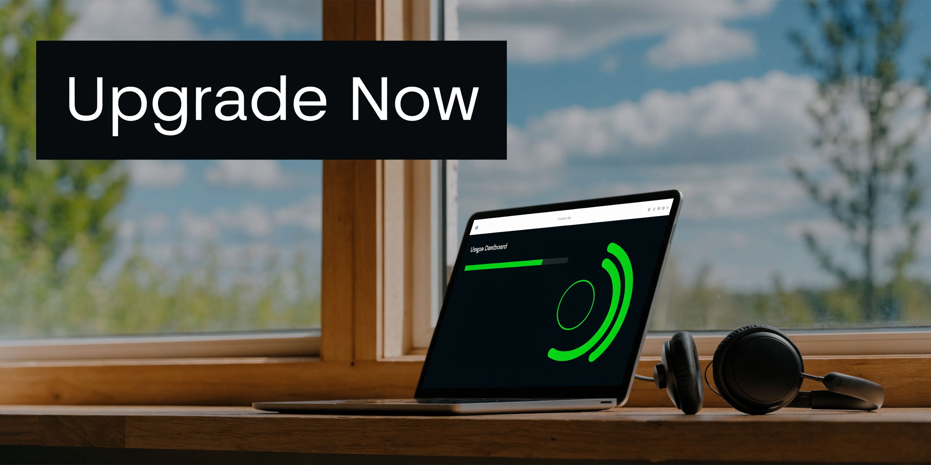 A modern laptop displaying a green loading progress bar and digital dashboard on a wooden windowsill.